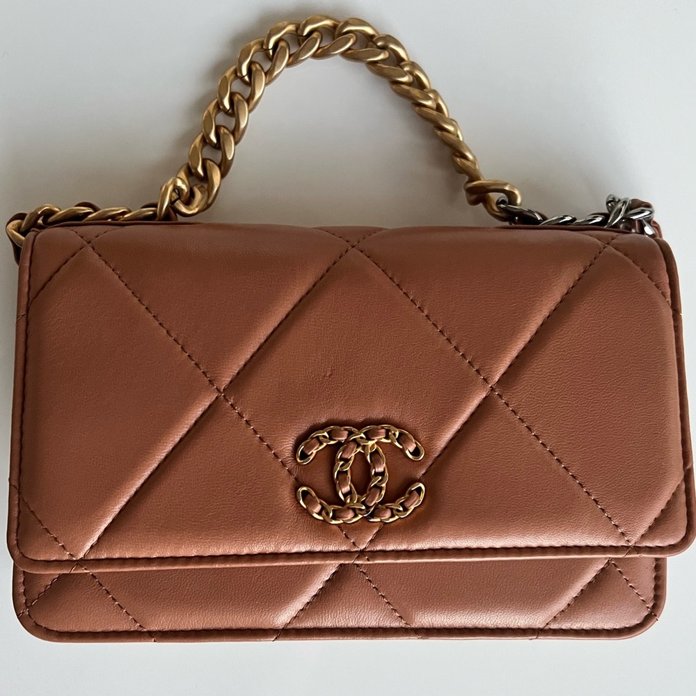 Authentic Chanel 19 WOC in Caramel. Comes with original receipt and Chanel box